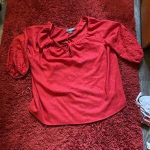 Jacquard Tie Neck Ruffle Top,